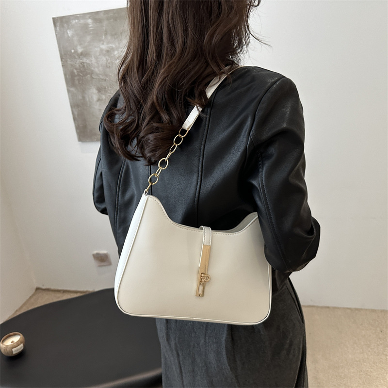 Bolso de alta sensación 2024, nuevo bolso de moda, primavera y verano, simple y versátil bolso de hombro de transporte, bolso de nicho de textura bajo la axila