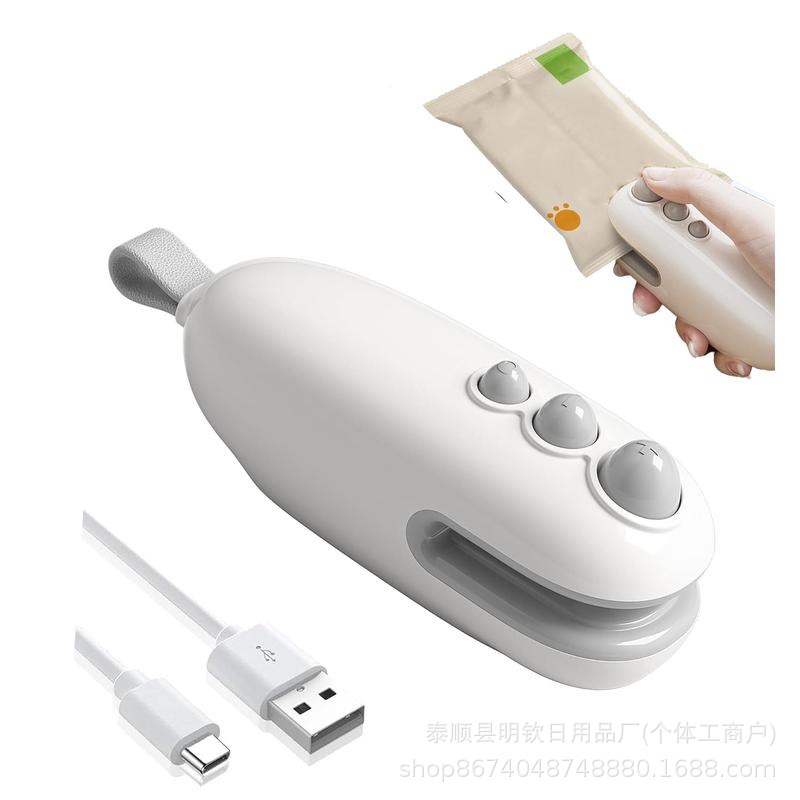 Mini hand-operated portable sealing machine for plastic bags