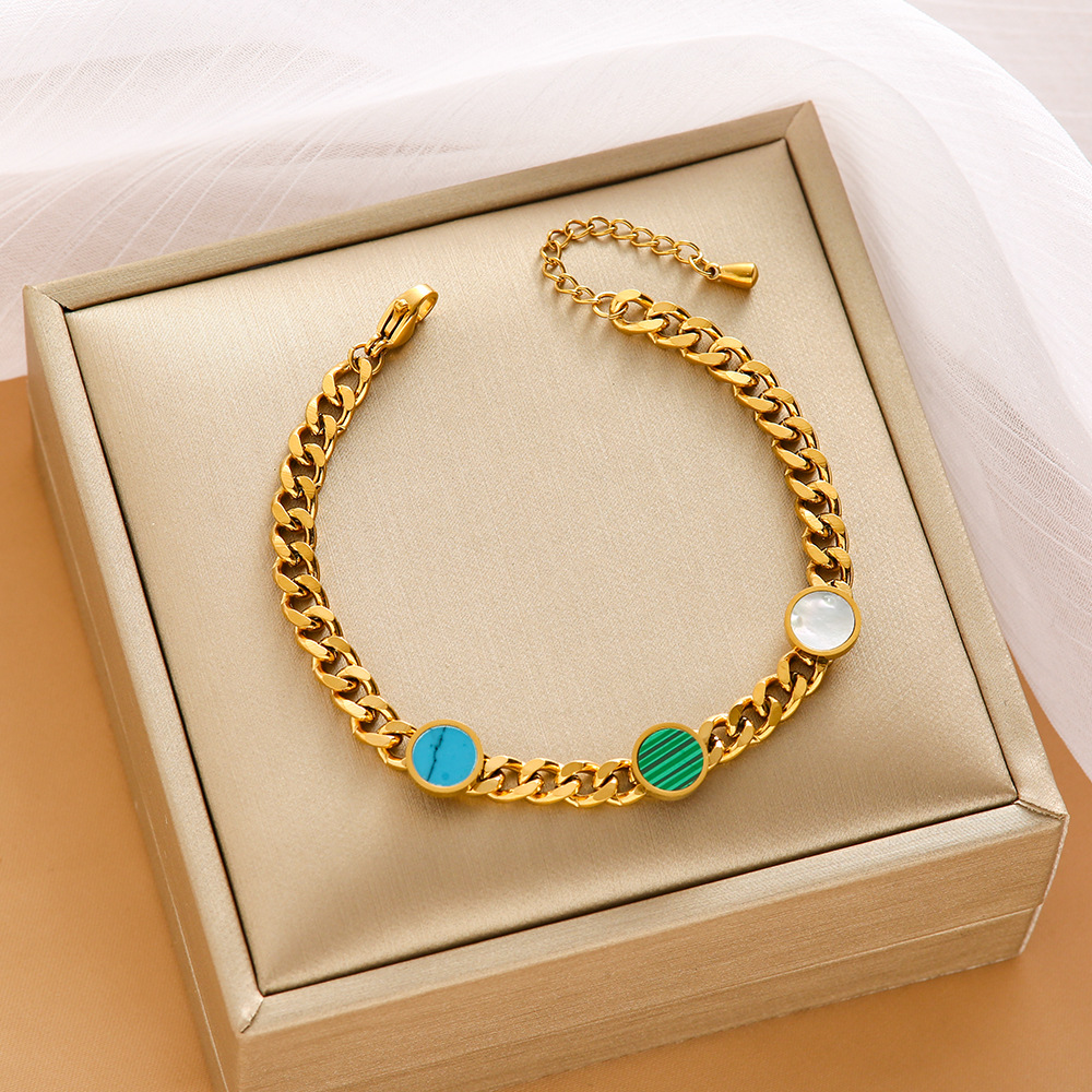 Pulsera de trébol de acero titanium vendedora caliente transfronteriza europea y americana con incrustaciones de concha pulsera colgante pulsera de diseño avanzado sin desvanecimiento al por mayor