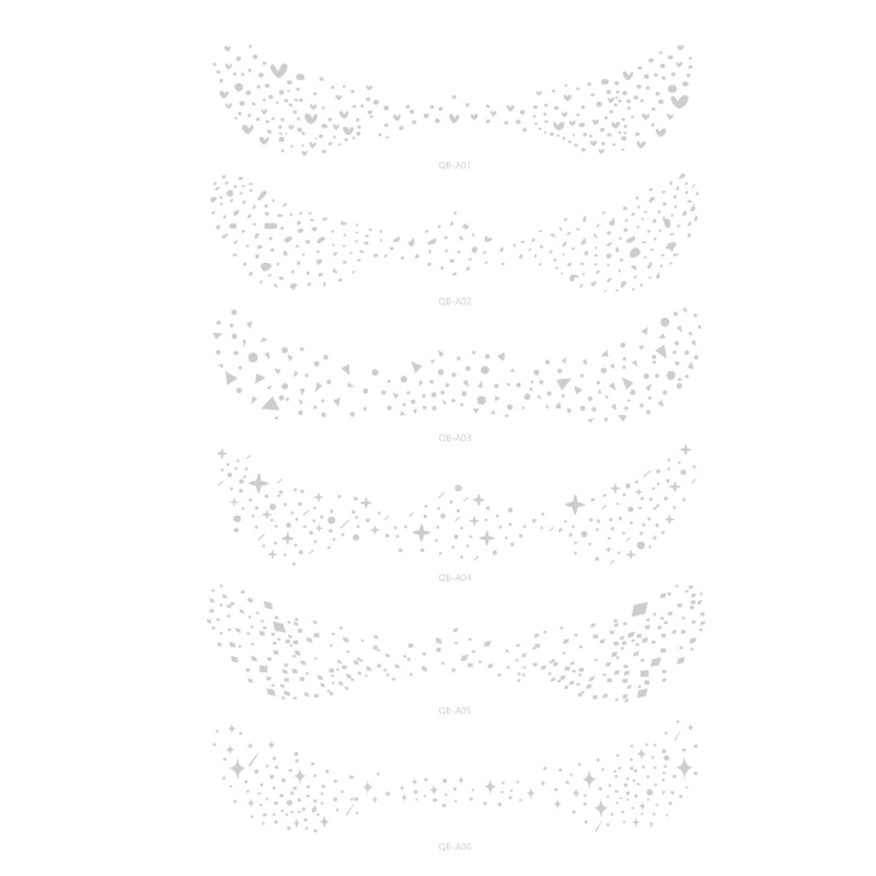 新しい箔押しそばかすの顔にタトゥーを貼ってバレンタインデーのファッションメイクの顔に欧米のシミのタトゥーのシールを貼った|undefined