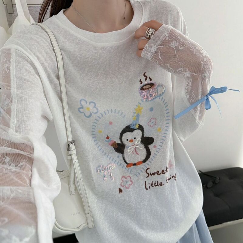 Sweet girl style sequined cartoon penguin sun protection shirt with lace mesh spliced sleeves, tie bow, slightly sheer and loose fit