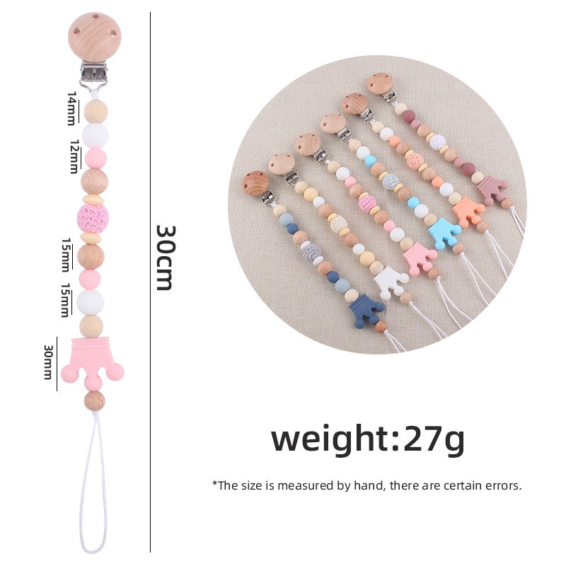 Nuevo bebé suministros Beech chupete clip DIY corona de dibujos animados mordedura de silicona molares chupete cadena anti-caída