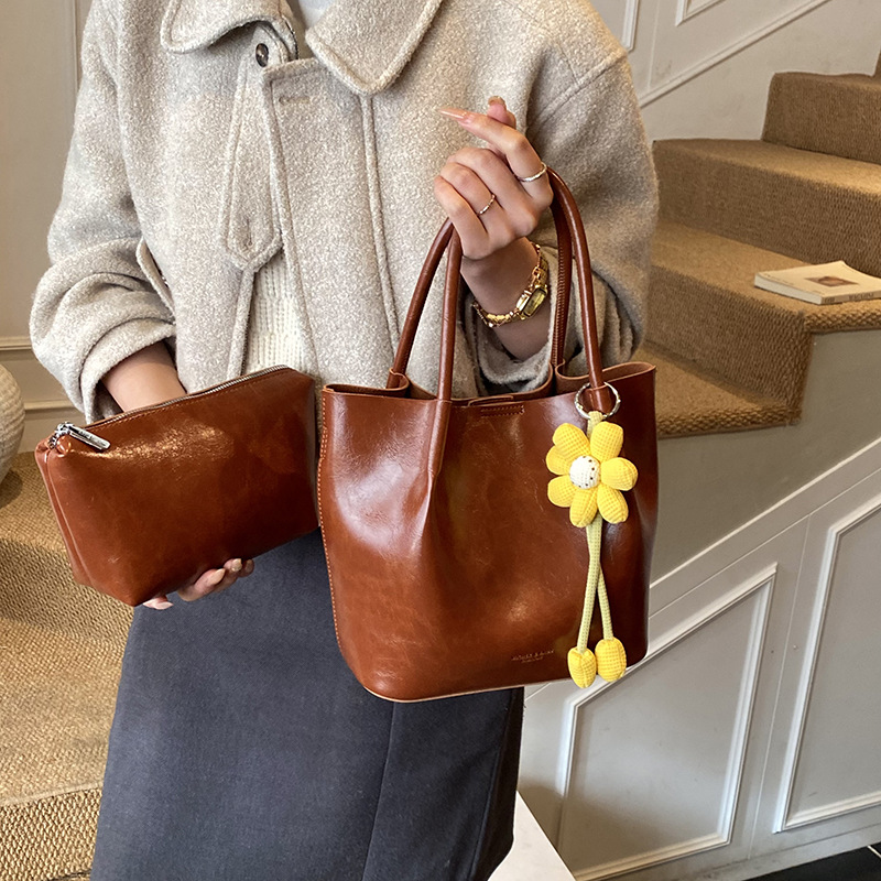 Nicho Zhong canasta de verduras de alto nivel, bolso de cubo, mujer 2025 nuevo retro bolso de trabajo, mochila de viaje