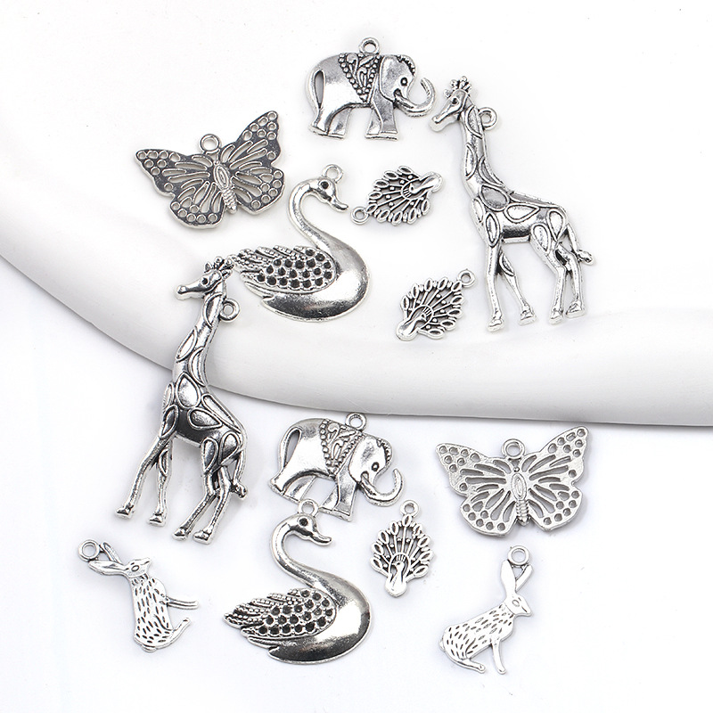 Wholesale animal series rabbit giraffe peacock pendant vintage alloy jewelry accessories A800340
