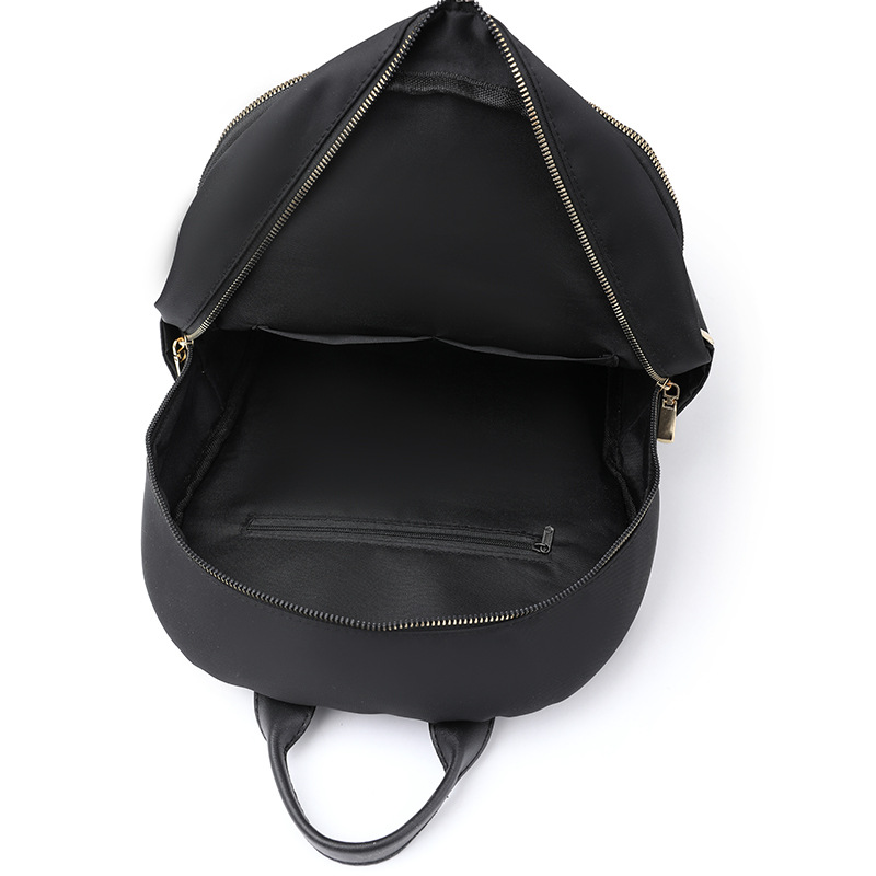 2022 nueva versión coreana de la mochila de nailon para mujer, mochila de cercanías urbana de todo fósforo de moda, mochila escolar ligera al aire libre