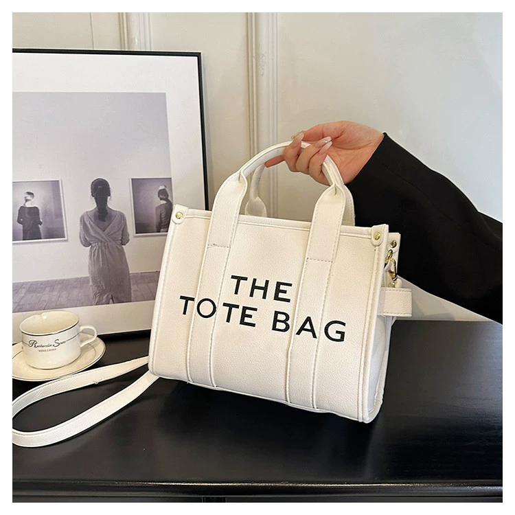 Handheld capacious purse, shoulder bag, one-shoulder bag, city style