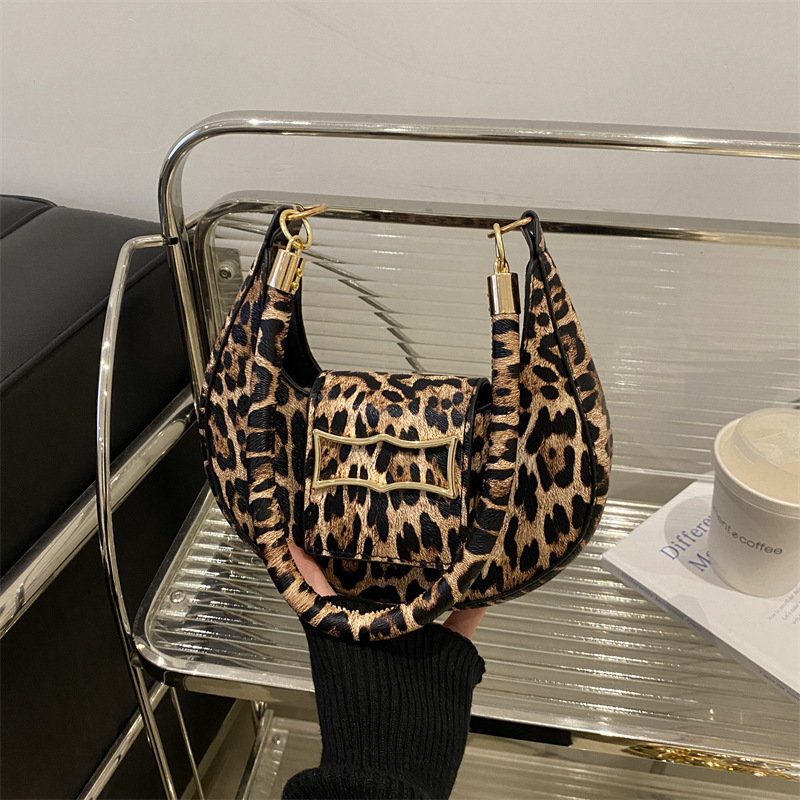 Moda impresión de leopardo bolso de brazo 2024 nuevo nicho de diseño bolso de mano personalidad de moda moda bolso de hombro de mujer
