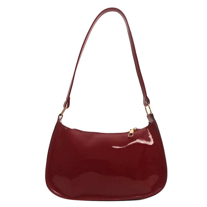 Comercio exterior nuevo bolso para mujeres 2024 verano retro bolso de brazo esmaltado bolso de palo de color sólido moda versátil