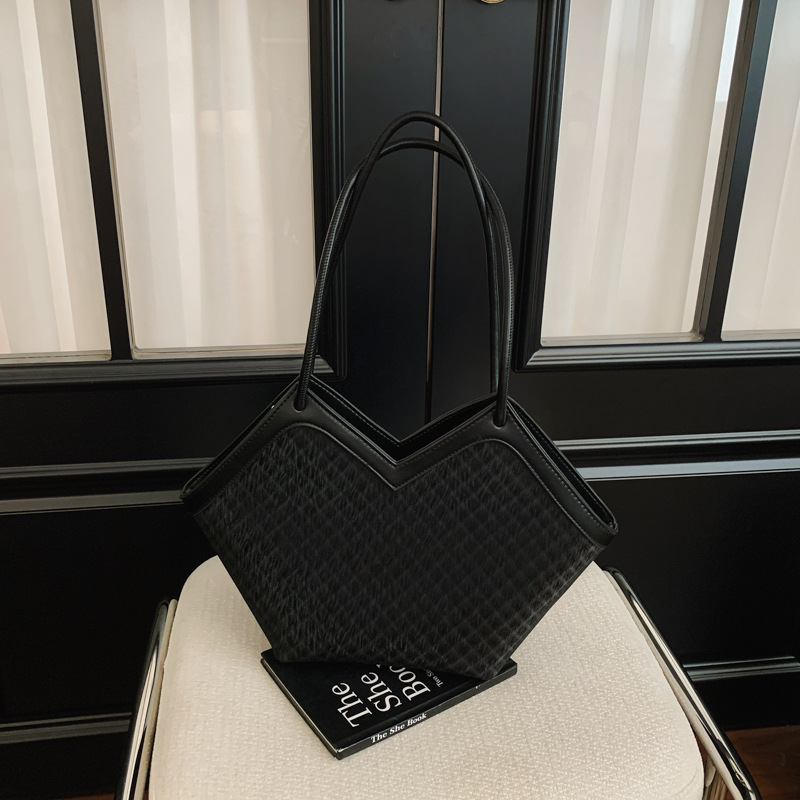 Nicho transfronterizo bolsas de diseño casual para mujeres 2026 nueva moda diaria de verano de gran capacidad de viaje a la axila bolsa de mano