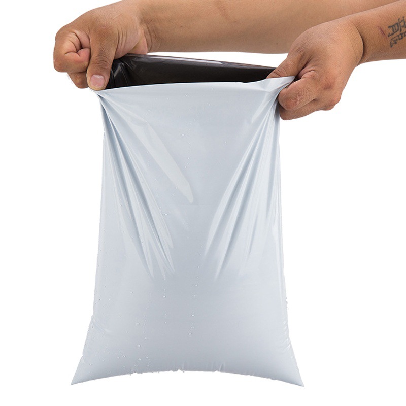 Bolsa exprés blanca, bolsa de embalaje gruesa, nuevo material, bolsa impermeable, bolsa de embalaje, fabricante de bolsas de embalaje de comercio electrónico, venta al por mayor