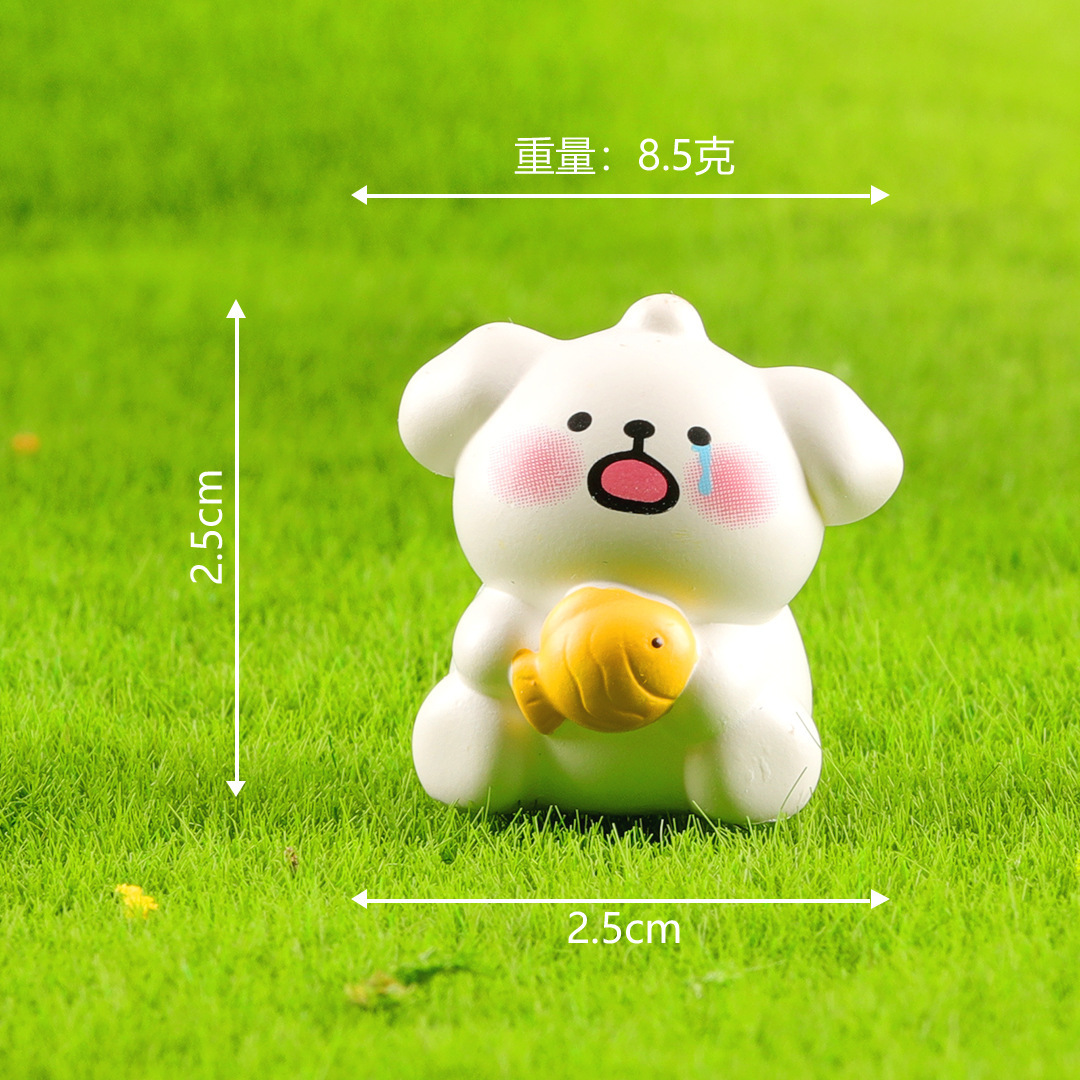 물고기를 안고 있는 라인 강아지