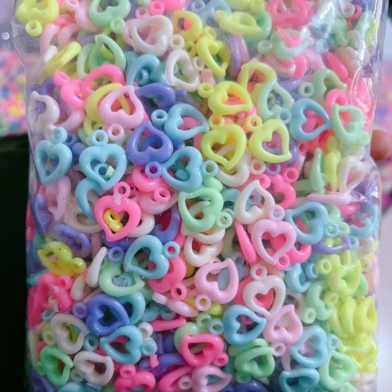 2025 Nuevas cuentas de cabello baratas en bolsa nuevas cuentas de plástico de color primavera diy gran agujero image 22
