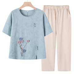 お母さんの夏の綿麻のスーツの中高年の婦人服の夏服のファッションの洋風の半袖のtシャツのおばあさんの夏の薄い服
