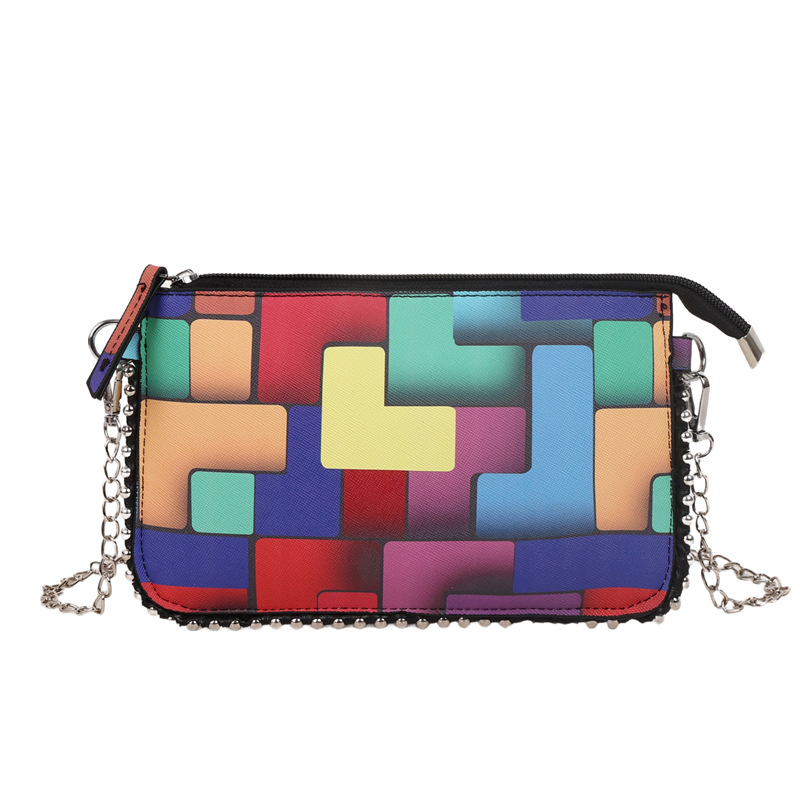 Personalidad de la tendencia de colores bolsos de mujer pintados 2025 nueva cadena de moda bolsos de mano simple bolsos de hombro de moda