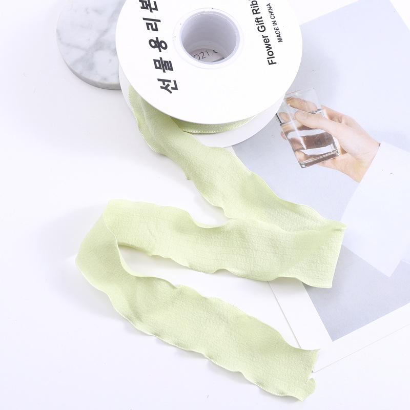 Nueva ola cinta plisada espina de pescado cinturón de hilo de oreja flor tienda de flores embalaje cinta pastel hornear cinturón de tela floral