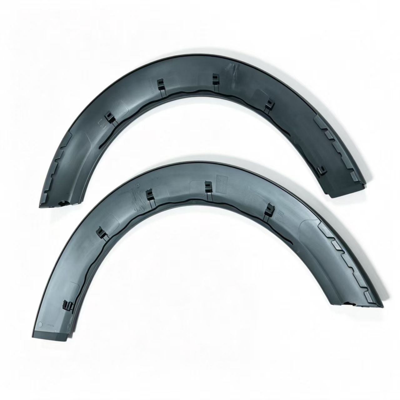BMW Mini, left and right rear wheel arches, part numbers 51777157105L and 51777157106R, with trim