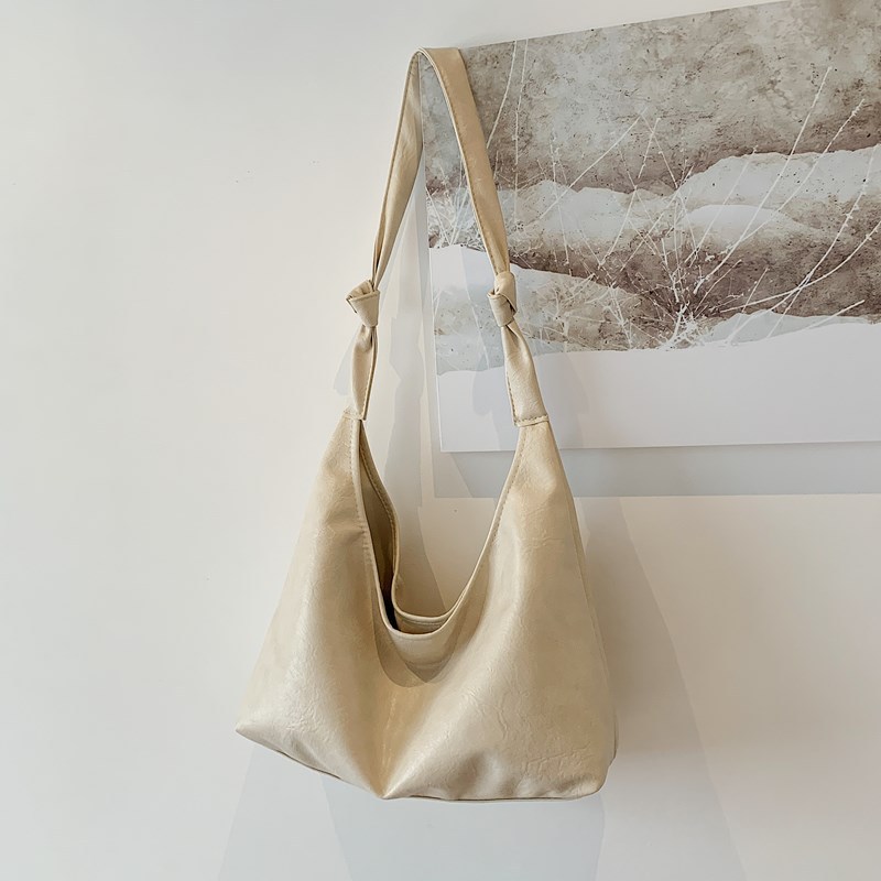 Bolsa de gran capacidad para viajar al trabajo Otoño / Invierno 2024, nueva bolsa de hombro de moda retro simple bolsa de abrigo casual