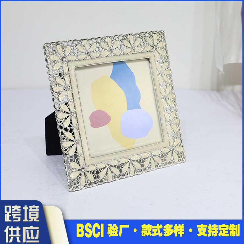 Cross-border light luxury diamond petal hollow zinc alloy metal photo frame table living room bedroom desktop ornaments wholesale
