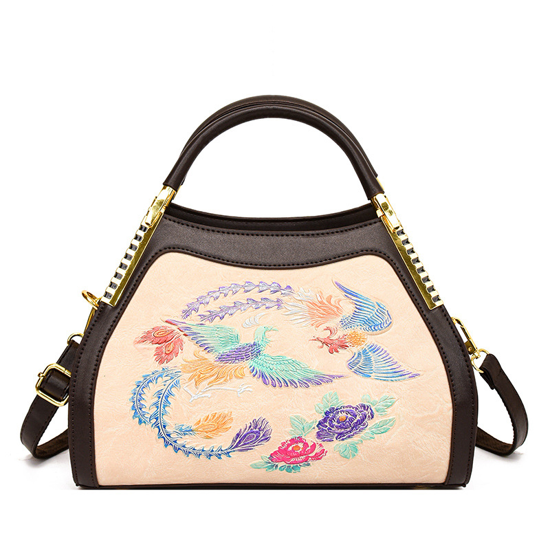 Luz de lujo de alta calidad retro nacional china en el viento de las madres mayores bolsas de mano en relieve de mujeres bolsas de hombro de un solo hombro