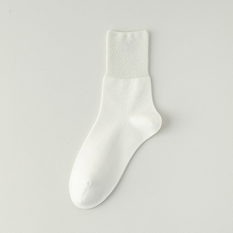 Calcetines de algodón de color sólido para hombres primavera, otoño y invierno en una máquina sin costura de hueso anti-balling embalaje independiente de calcetines de algodón