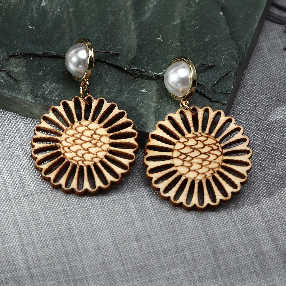 Creative Personality Sunflower Hollow Wood Retro Earrings Jewelry display picture 5