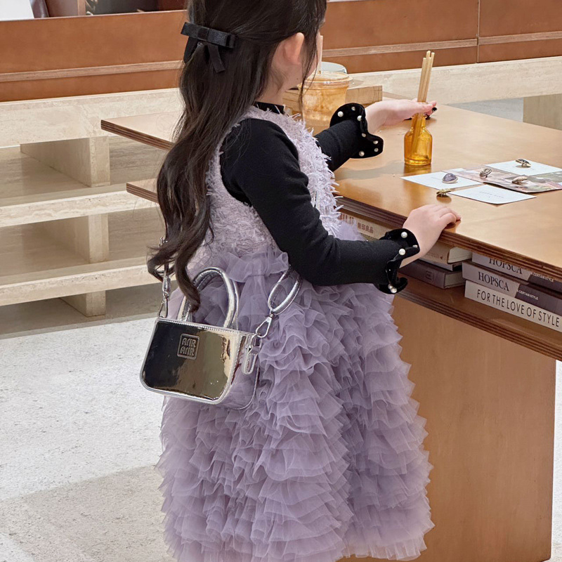 Bolsa de hombro coreana para niñas de color sólido, bolso láser de moda, mini bolso para bebés, 2025 nuevo bolso para niños