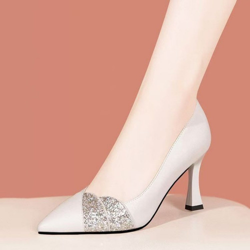 Women's pointed-toe stiletto pumps with white crystal embellishments, versatile soft leather shoes suitable for all seasons, elegant and stylish single shoes for a refined look.