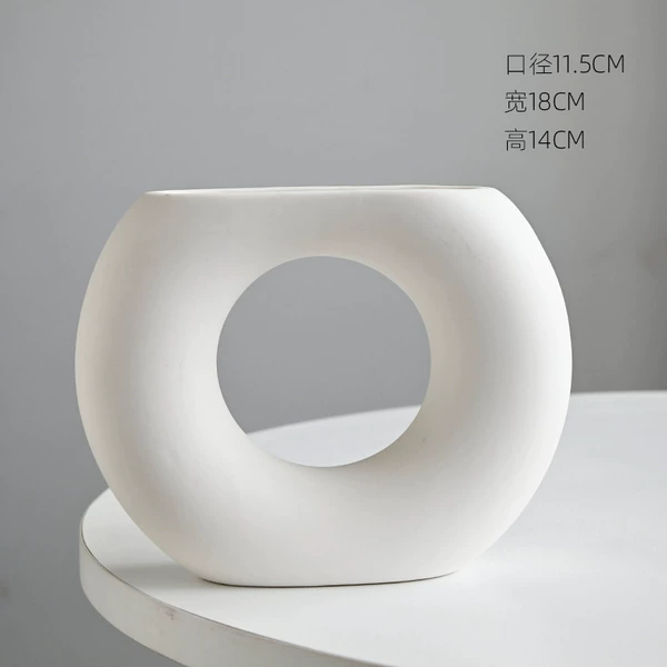 White-semicircular vase