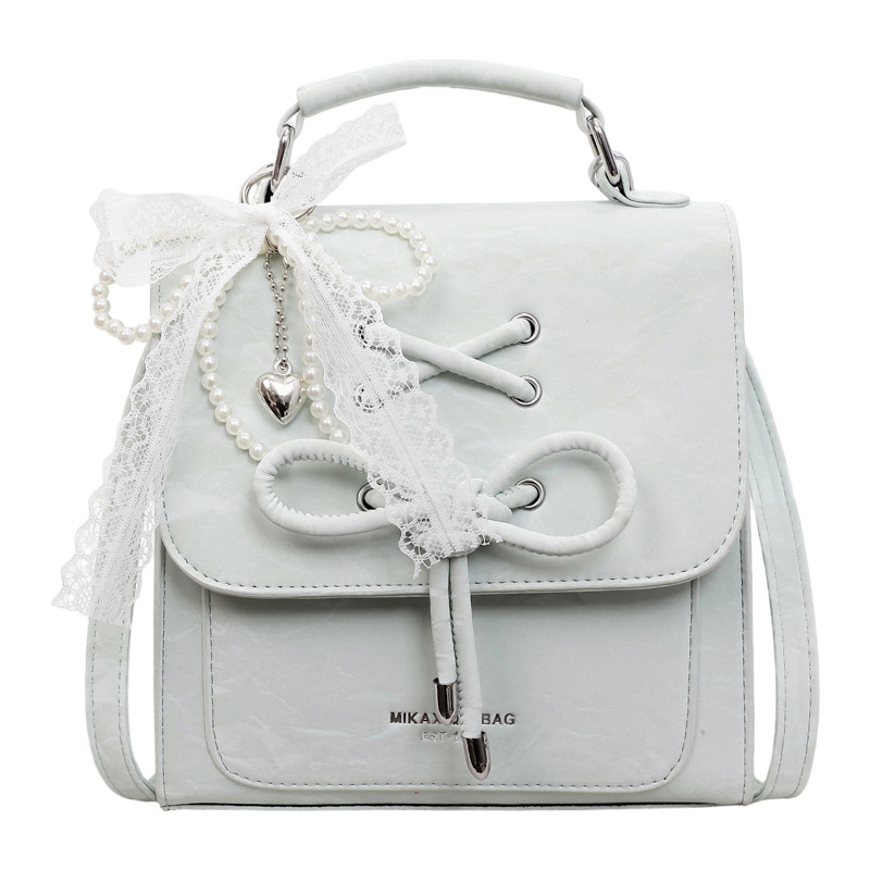 Bolso portátil para mujeres 2026 primavera / verano estilo coreano simple mochila casual nicho sensación cotidiana de moda mochila pequeña image 7