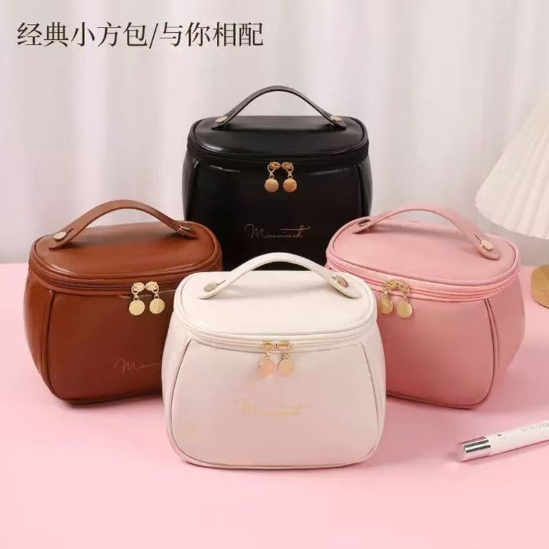 New cross-border women's large-capacity PU leather portable hand-held travel cosmetic storage and toiletry bag