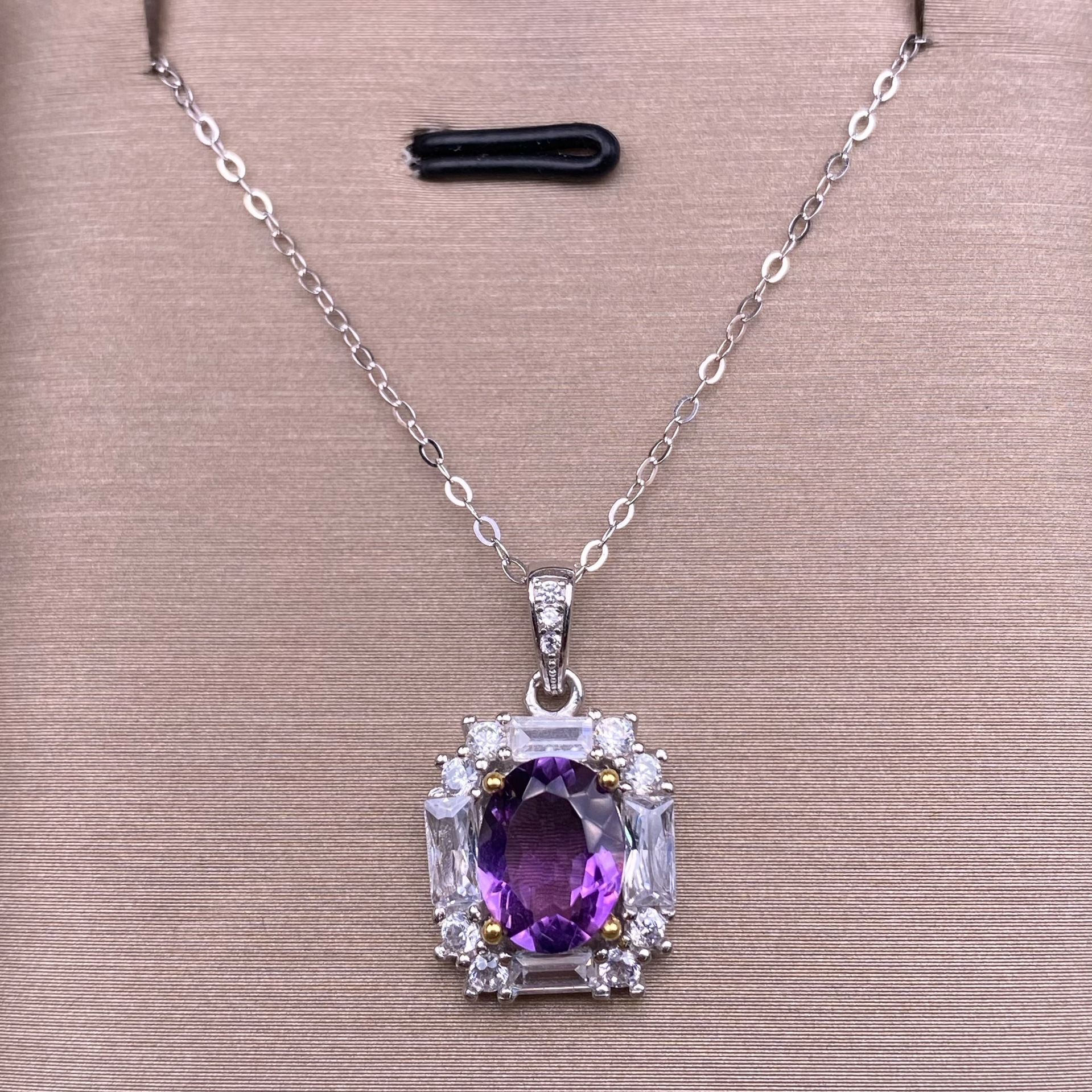 Crystal pendant with amethyst