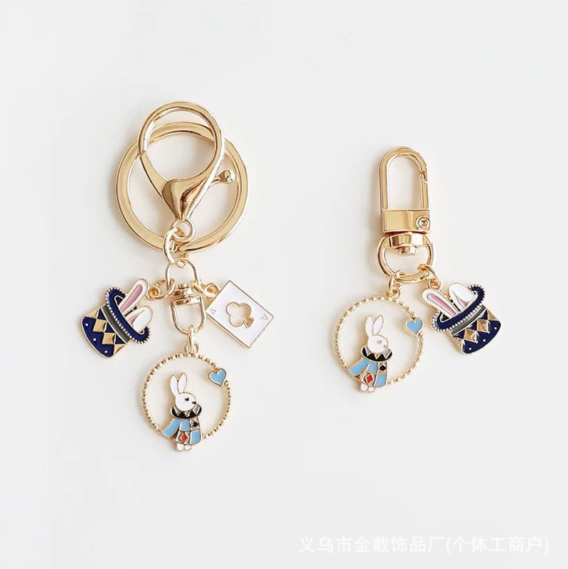 Alice in Wonderland Keychain Magic Hat White Rabbit Plum Blossom Poker Alloy Pendant for Girlfriends' Backpack Decoration Alice in Wonderland Keychain Magic Hat White Rabbit Plum Blossom Poker Alloy Pendant for Girlfriends' Backpack Decoration