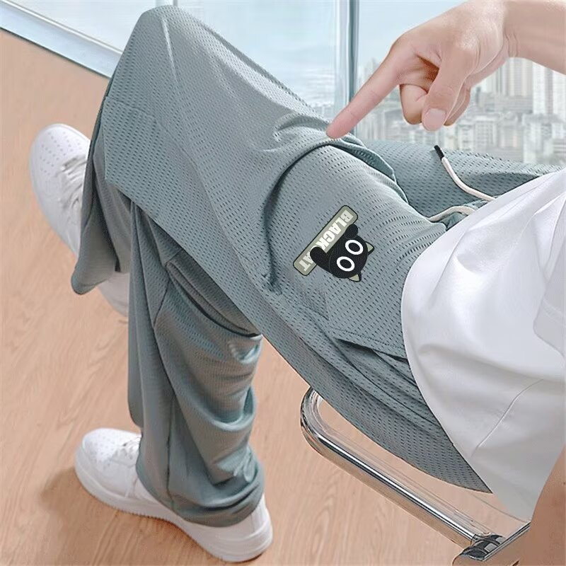 Pantalones casuales delgados de verano, pantalones casuales de hombre, impresión negra, pantalones deportivos rectos de tamaño grande, 2025 nuevos