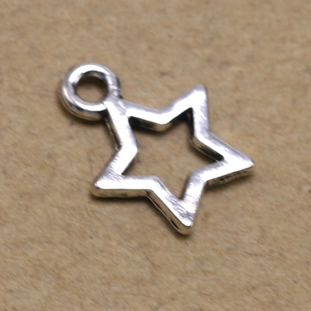 유럽과 미국의 zakka 빈티지 합금 중공 다섯개 별 펜던트 액세서리 DIY 보석 액세서리 공장 도매