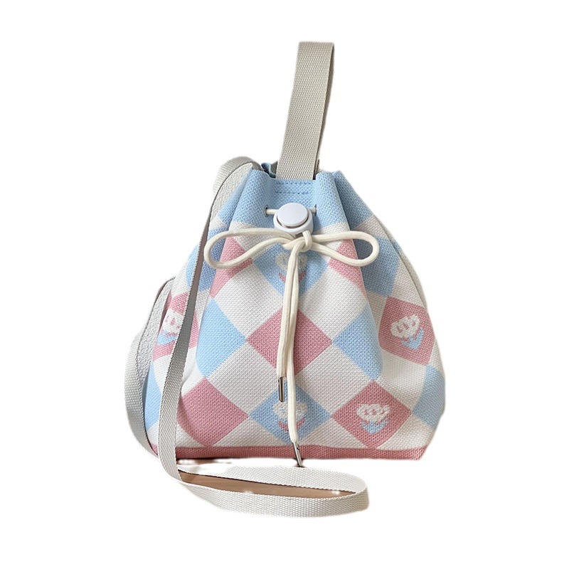 2025 nuevo diseño japonés y coreano simple bolso de hombro de punto de moda femenina versátil bolso portátil de viaje de verano