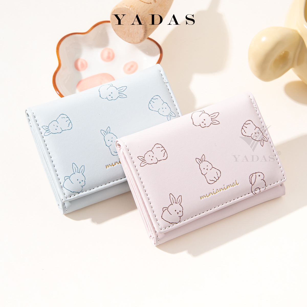 Monedero japonés simple para mujeres corto delgado y compacto cartera de estudiantes plegables nueva cartera de nicho encantadora