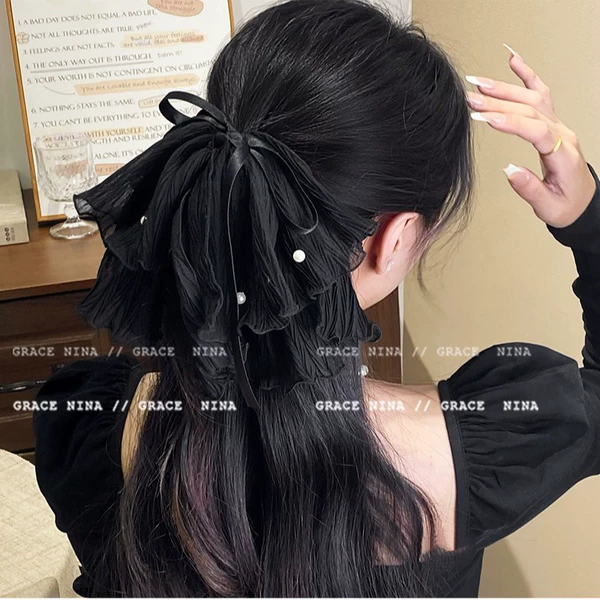 Black hair band with bow, ponytail, crab pin