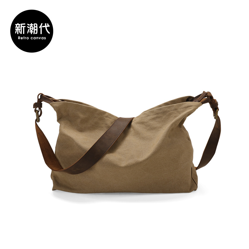 The men's shoulder bag 2022 summer new pattern Korean Edition leisure time Canvas bag capacity Trend Simplicity Messenger schoolbag