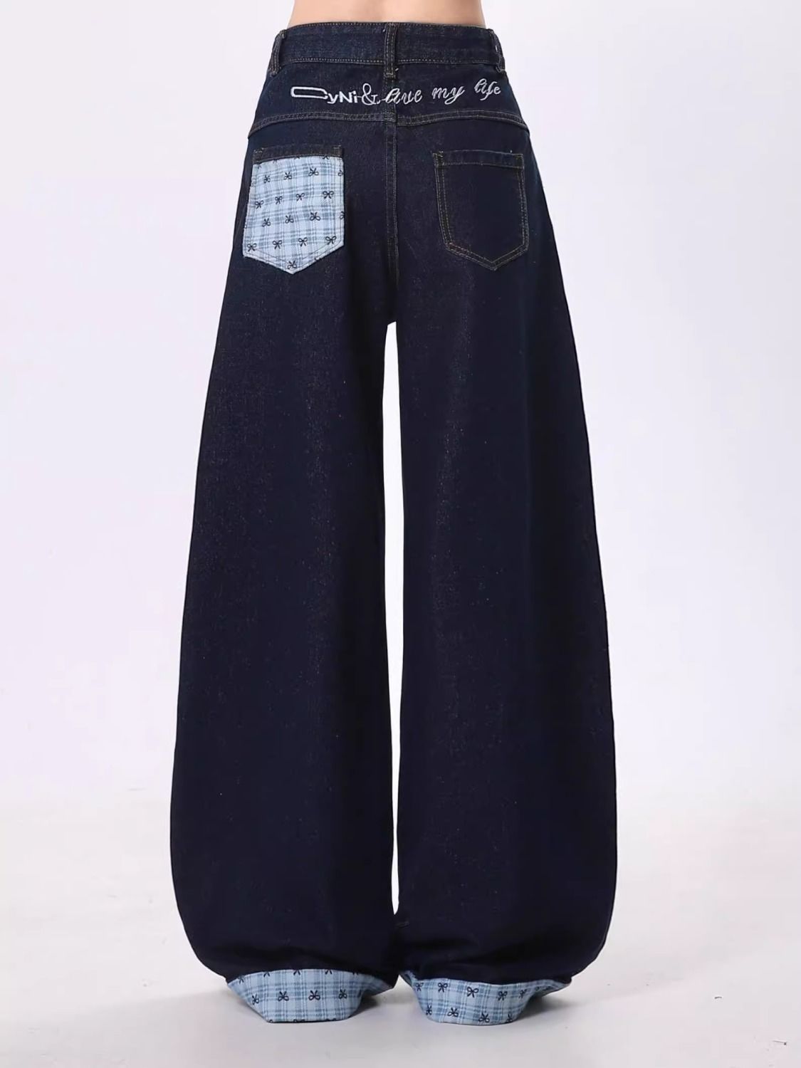 Completo pantalone donna polo ricamata e jeans gamba larga_voghion.com