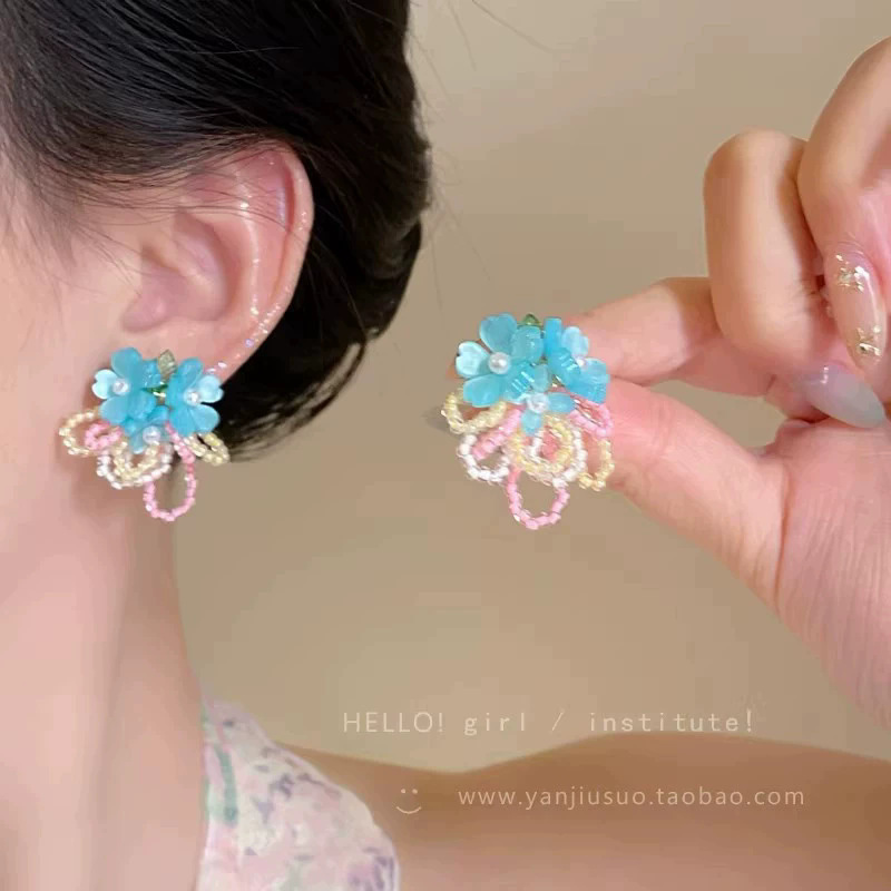 2026 viento falso sensación de atmósfera super inmortal pendientes de flores de malla temperamento suave de chiffon para mujeres pendientes