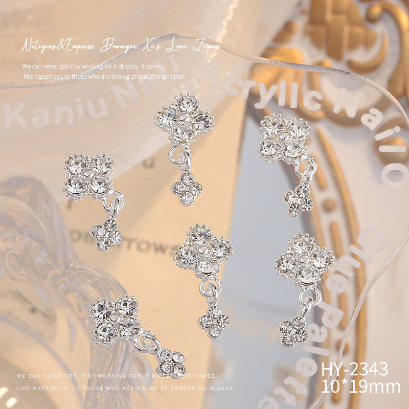 Nueva joyería de aleación de manicura completa diamante borla arco corona plata uñas manicura joyería accesorios al por mayor