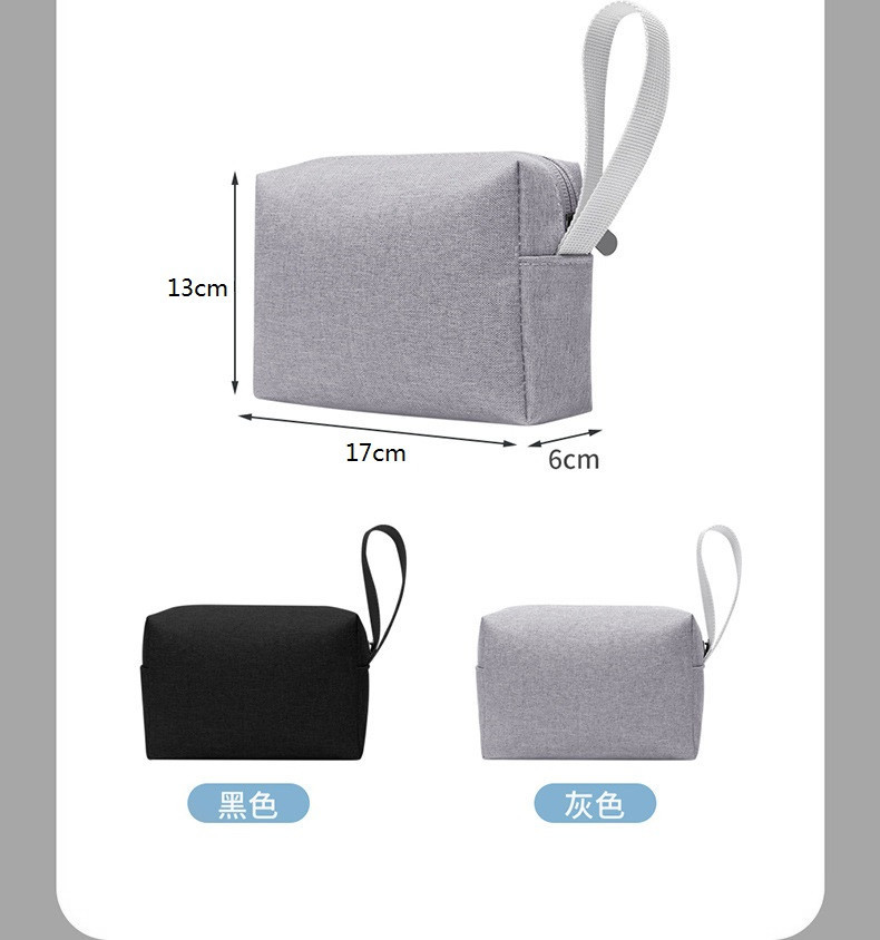 Cross-border in-stock hand-held toiletry bag 300D cationic waterproof cosmetic bag Oxford cloth storage notebook power bag undefined