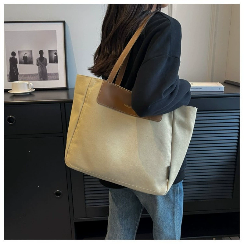 Demi-season universal capacious shoulder bag
