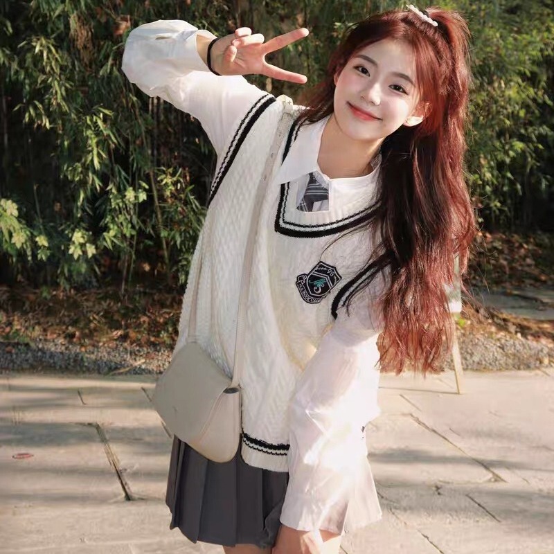 Preppy style suit women's spring and autumn small age-reducing knitted sweater vest stacked long-sleeved shirt two-piece suit
