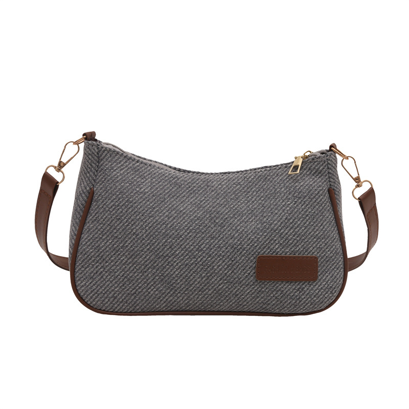 Elegante y simple temperamento nicho bolso de hombro casual 2025 primavera nuevo bolso de mochila de mujer versión coreana bolso popular