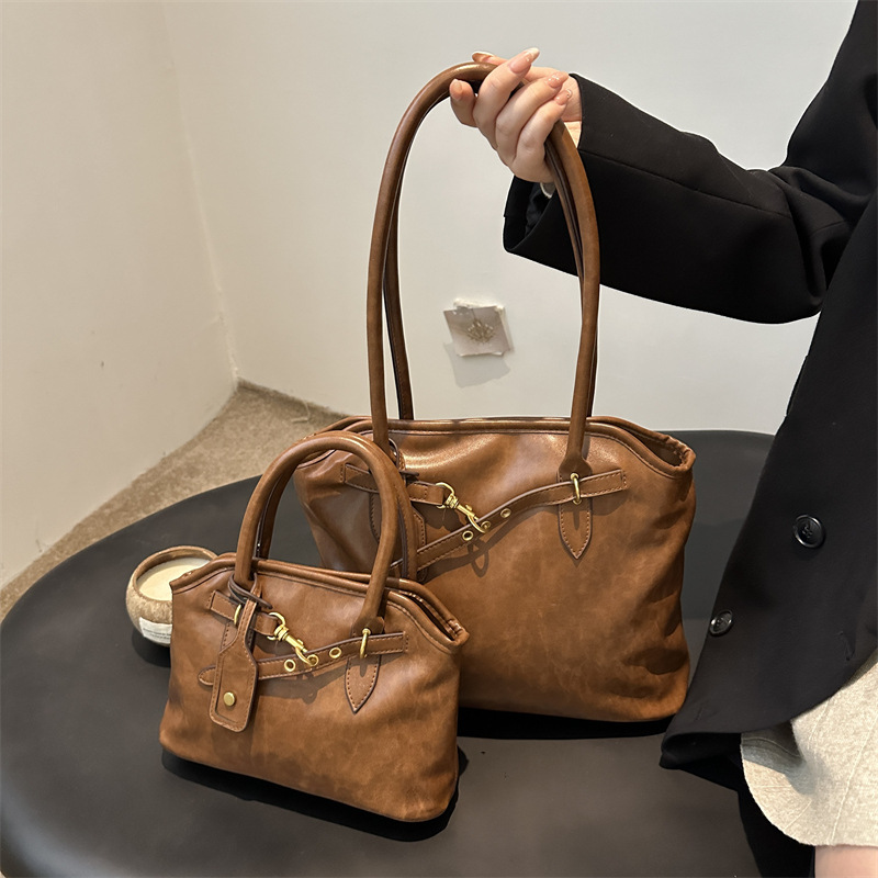 Nicho de diseño de mochila simple de hombro retro bolso de gran capacidad para mujeres 2024 nueva moda bolso de mano