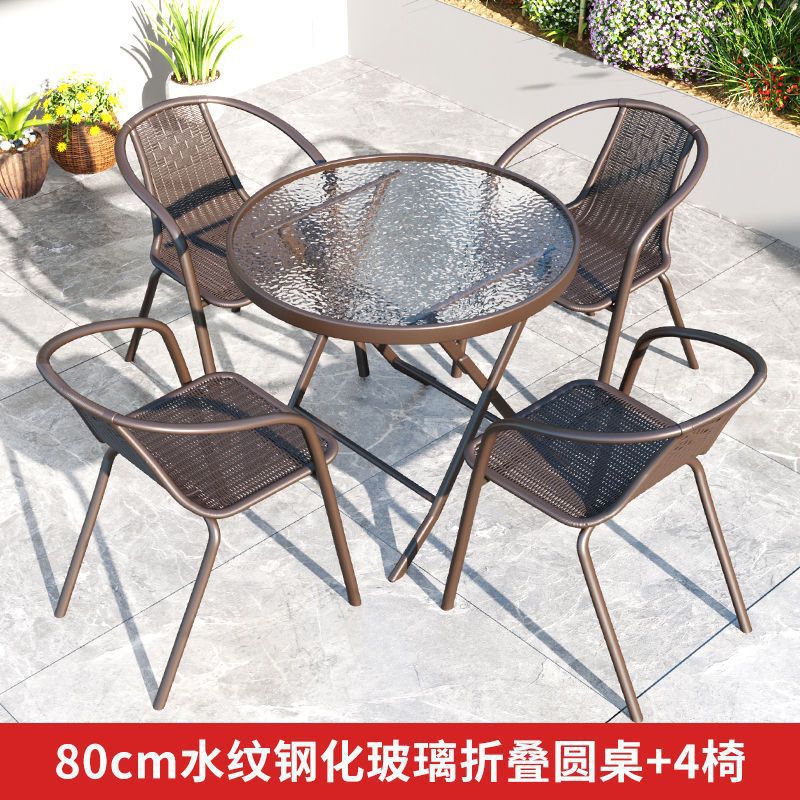 20% off stacked water pattern round table + 4 chairs