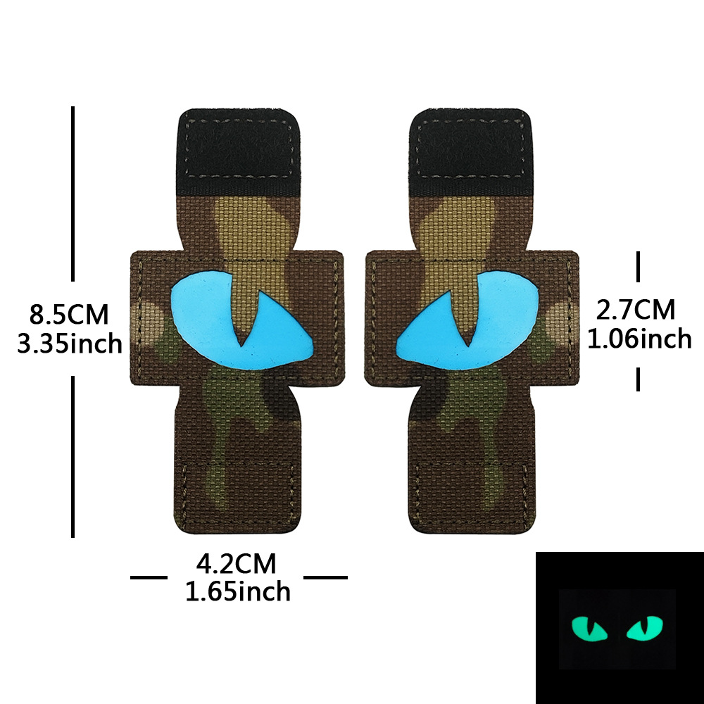 Creativo suministro personalizado gato ojo luminoso moral sello al aire libre militar fan mochila sello pequeño diablo militar MOLLE colgante