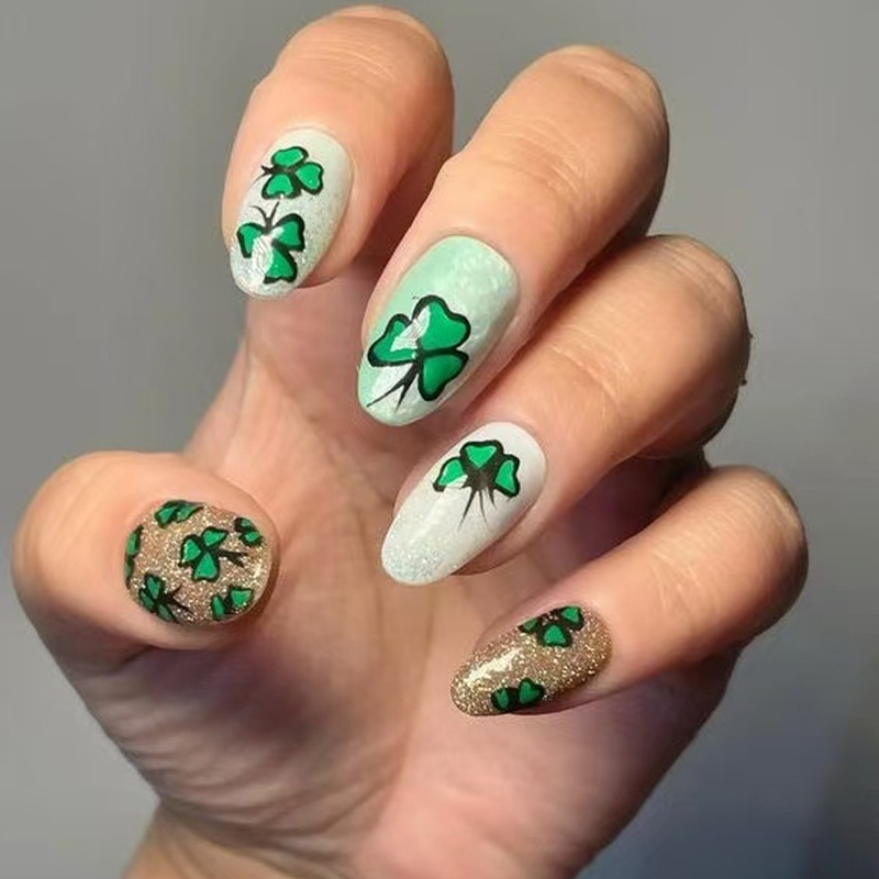 Green and White Jade with Golden Sparkle St. Patrick's Day Clover Pattern Design Short Oval Wearable Nail Art Green and White Jade with Golden Sparkle St. Patrick's Day Clover Pattern Design Short Oval Wearable Nail Art