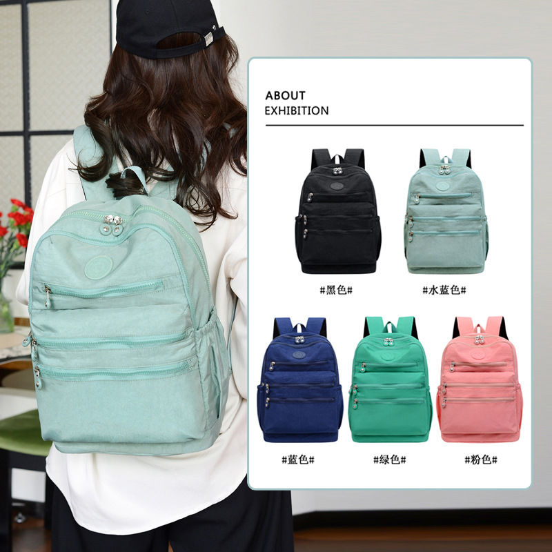 热款双肩包轻便透气旅行大包休闲尼龙布包背包男女包学生书包百搭